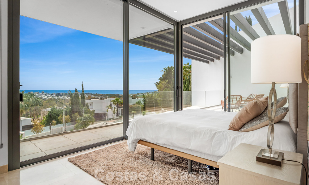 Contemporary modern villa with panoramic sea views for sale in a prestigious golf area in Marbella - Benahavís 798848