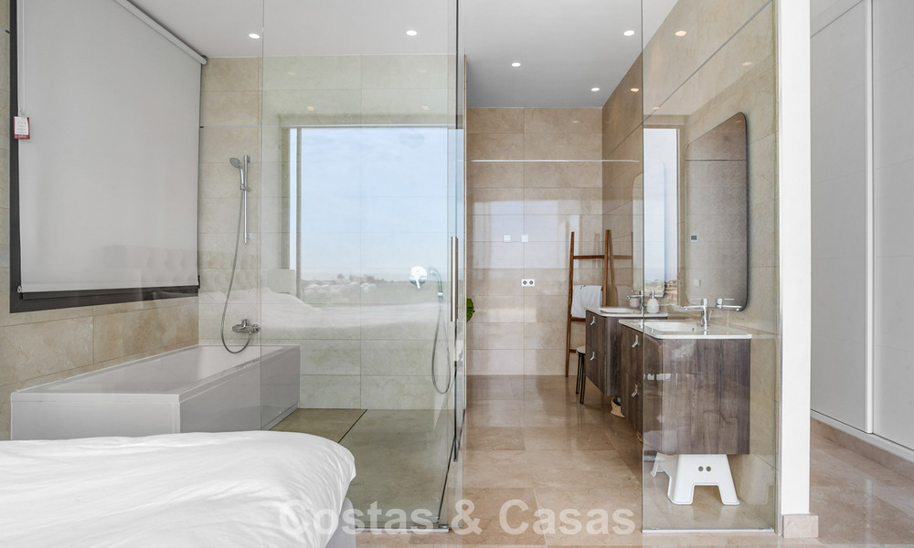 Contemporary modern villa with panoramic sea views for sale in a prestigious golf area in Marbella - Benahavís 798854