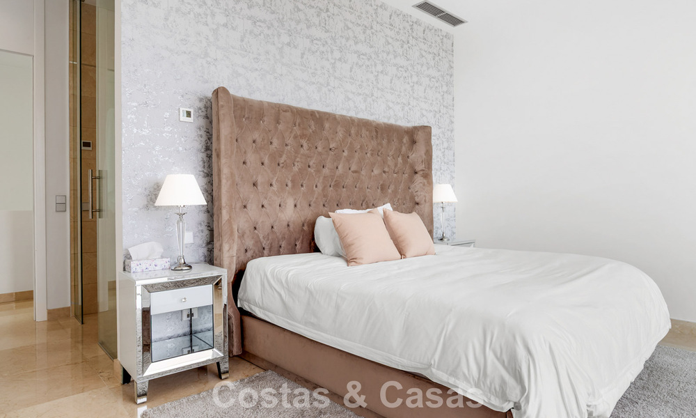 Contemporary modern villa with panoramic sea views for sale in a prestigious golf area in Marbella - Benahavís 798857