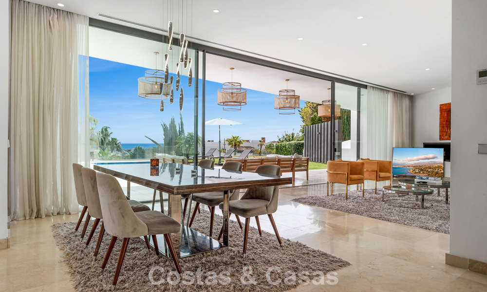 Contemporary modern villa with panoramic sea views for sale in a prestigious golf area in Marbella - Benahavís 798860