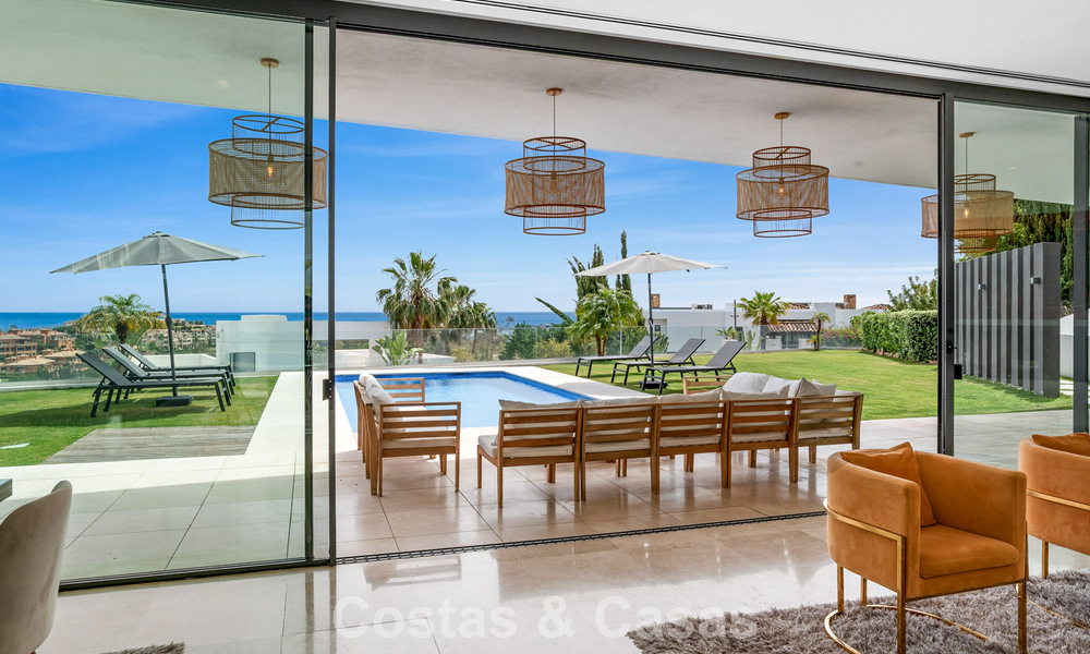 Contemporary modern villa with panoramic sea views for sale in a prestigious golf area in Marbella - Benahavís 798866