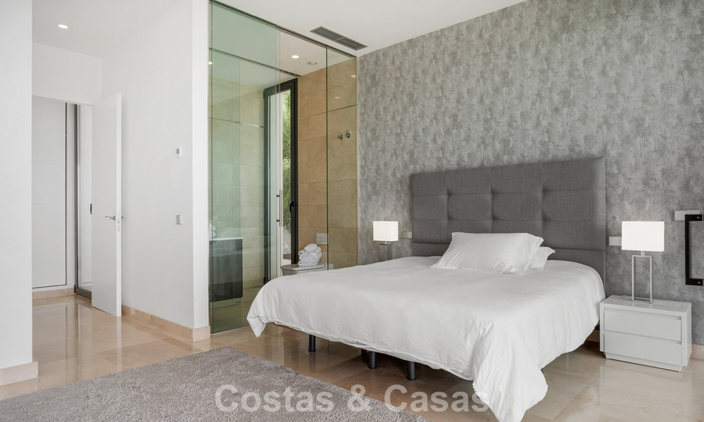 Contemporary modern villa with panoramic sea views for sale in a prestigious golf area in Marbella - Benahavís 798869