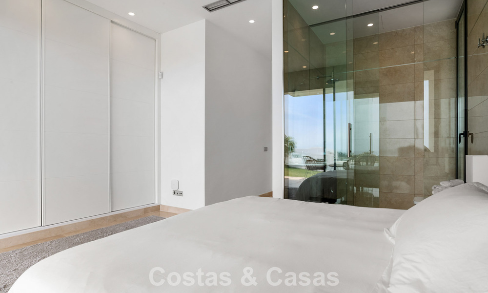 Contemporary modern villa with panoramic sea views for sale in a prestigious golf area in Marbella - Benahavís 798870