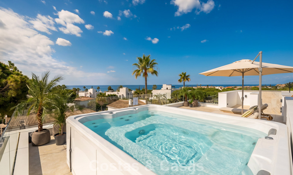 High-end beachside villa with rooftop terrace and jacuzzi with sea views for sale east of Marbella Centre 799196