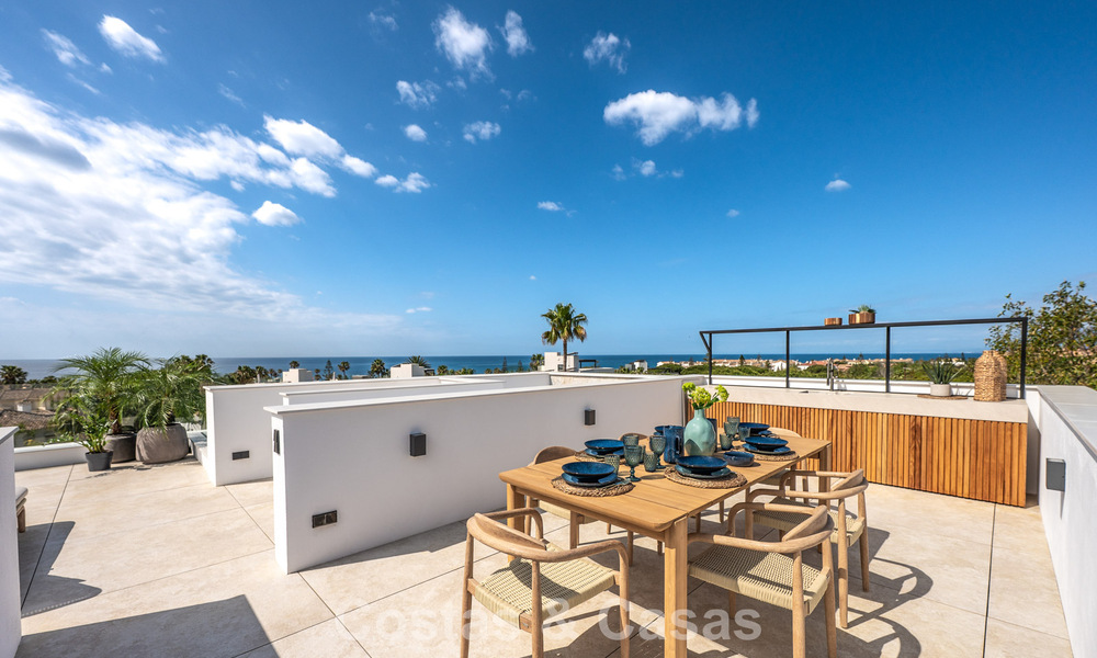 High-end beachside villa with rooftop terrace and jacuzzi with sea views for sale east of Marbella Centre 799202
