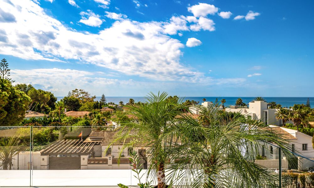 High-end beachside villa with rooftop terrace and jacuzzi with sea views for sale east of Marbella Centre 799205
