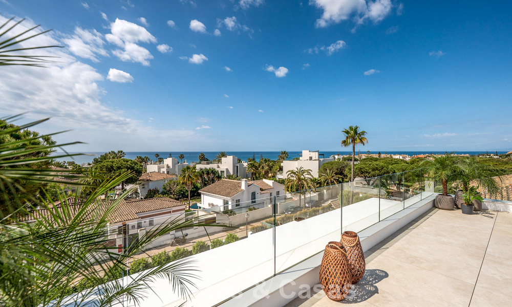 High-end beachside villa with rooftop terrace and jacuzzi with sea views for sale east of Marbella Centre 799206
