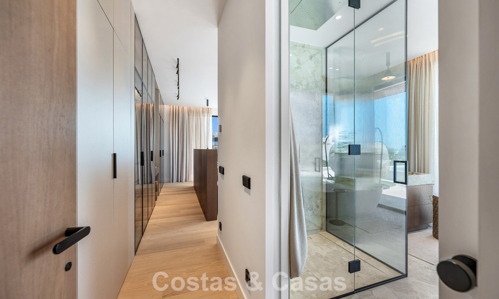 High-end beachside villa with rooftop terrace and jacuzzi with sea views for sale east of Marbella Centre 799207