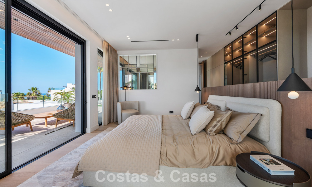 High-end beachside villa with rooftop terrace and jacuzzi with sea views for sale east of Marbella Centre 799211
