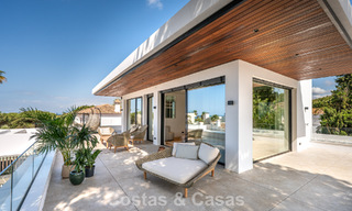 High-end beachside villa with rooftop terrace and jacuzzi with sea views for sale east of Marbella Centre 799215 
