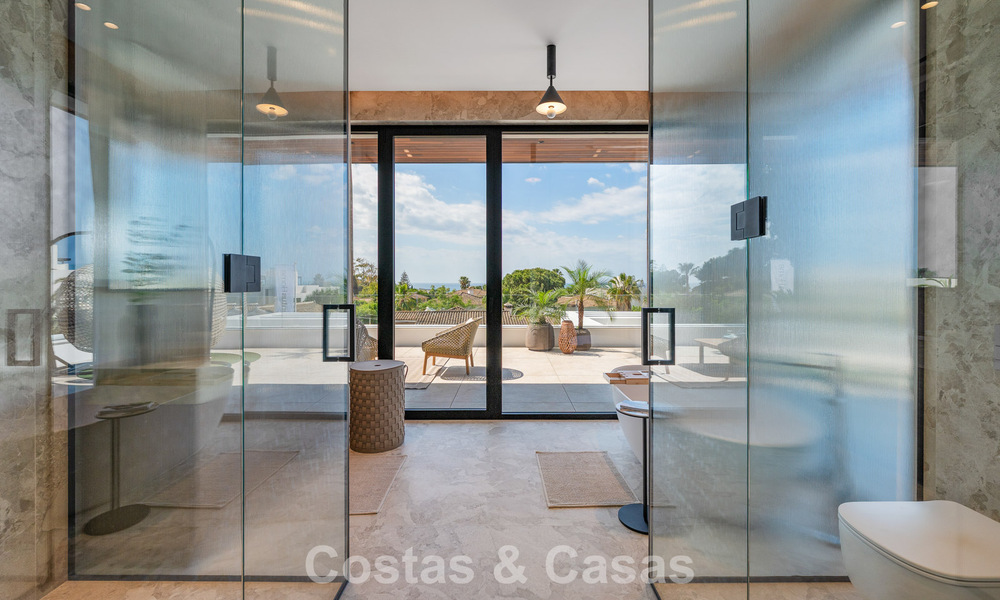 High-end beachside villa with rooftop terrace and jacuzzi with sea views for sale east of Marbella Centre 799223