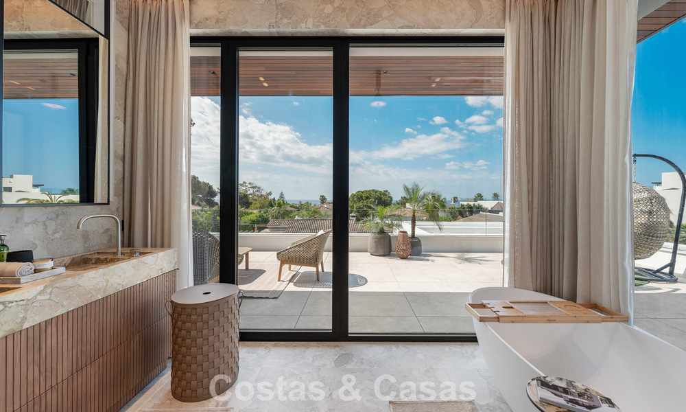 High-end beachside villa with rooftop terrace and jacuzzi with sea views for sale east of Marbella Centre 799224
