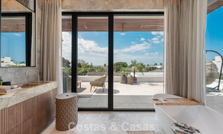 High-end beachside villa with rooftop terrace and jacuzzi with sea views for sale east of Marbella Centre 799224 