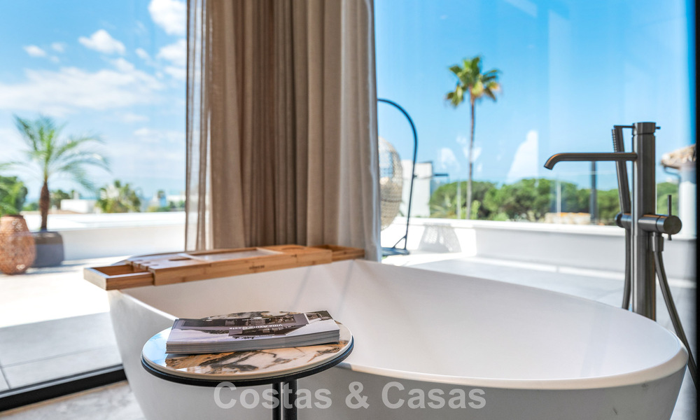 High-end beachside villa with rooftop terrace and jacuzzi with sea views for sale east of Marbella Centre 799226