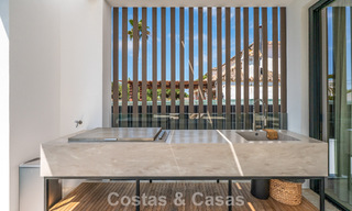 High-end beachside villa with rooftop terrace and jacuzzi with sea views for sale east of Marbella Centre 799283 