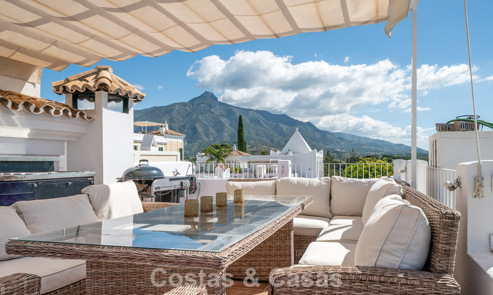 Beautiful townhouse with panoramic views for sale within walking distance of amenities in Nueva Andalucía, Marbella 799508