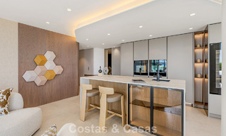 Exclusive renovated frontline beach apartment with direct sea views for sale on the New Golden Mile, Estepona East 799569 