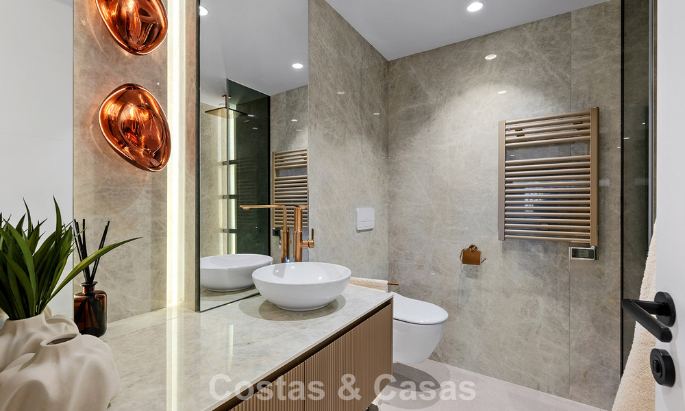 Exclusive renovated frontline beach apartment with direct sea views for sale on the New Golden Mile, Estepona East 799581