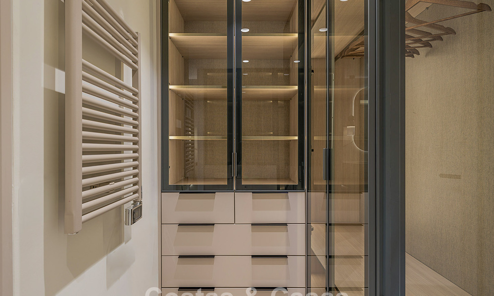 Exclusive renovated frontline beach apartment with direct sea views for sale on the New Golden Mile, Estepona East 799583