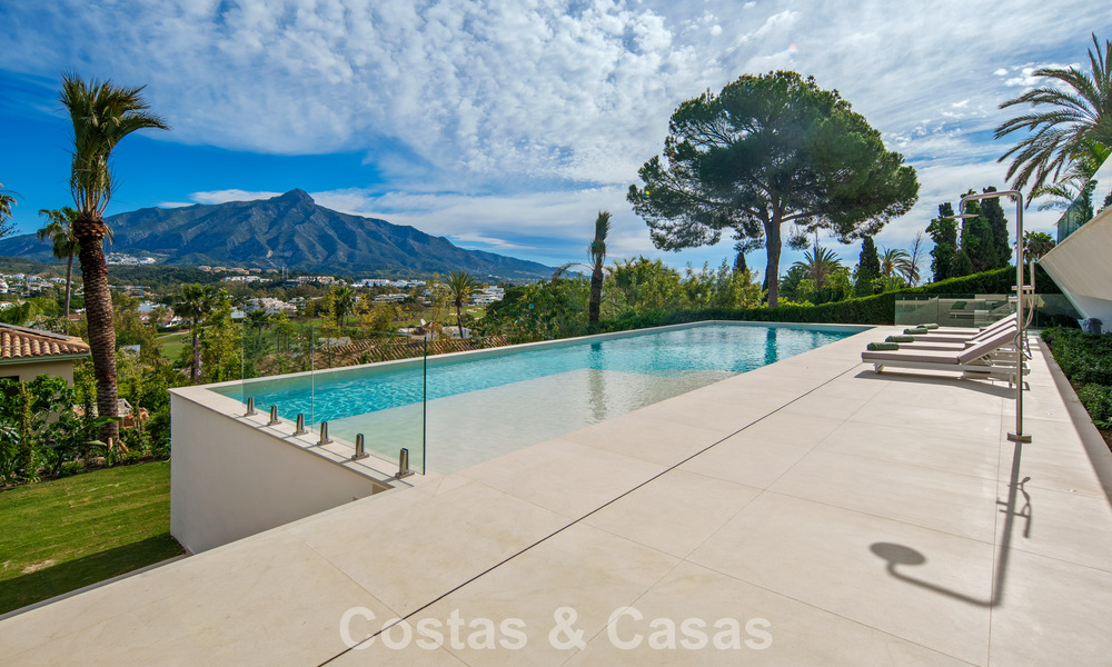 Contemporary designer villa with panoramic views for sale in Nueva Andalucía’s Golf Valley, Marbella 800170