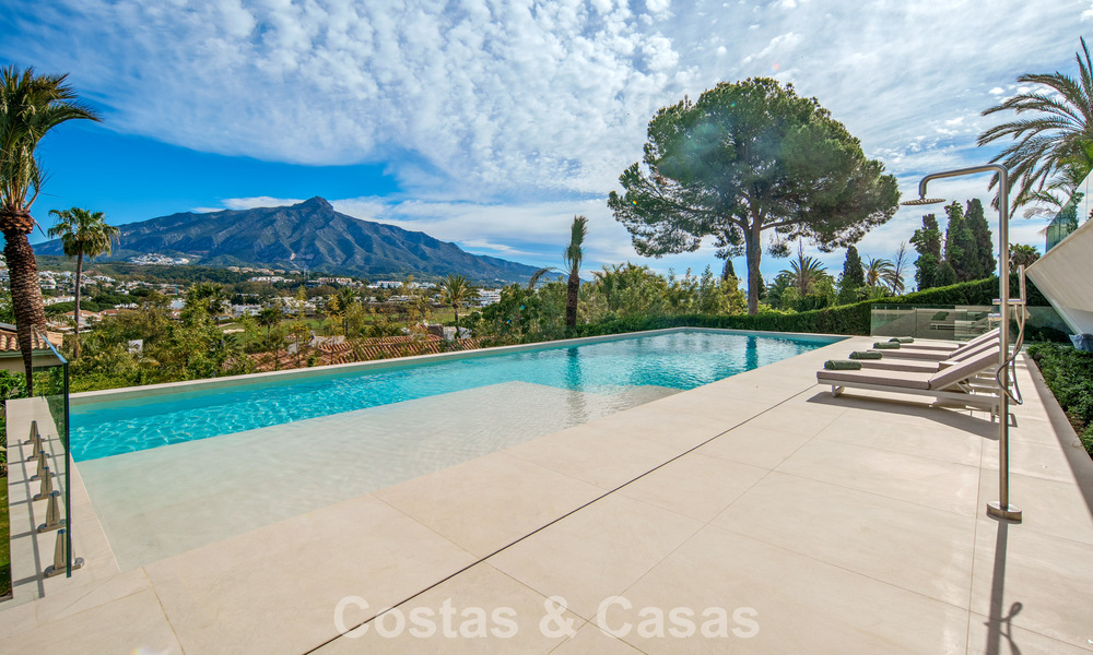Contemporary designer villa with panoramic views for sale in Nueva Andalucía’s Golf Valley, Marbella 800171