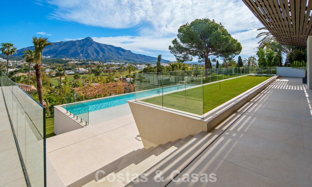 Contemporary designer villa with panoramic views for sale in Nueva Andalucía’s Golf Valley, Marbella 800172