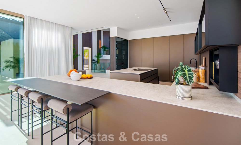 Contemporary designer villa with panoramic views for sale in Nueva Andalucía’s Golf Valley, Marbella 800174