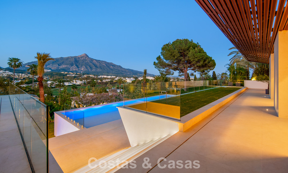 Contemporary designer villa with panoramic views for sale in Nueva Andalucía’s Golf Valley, Marbella 800192