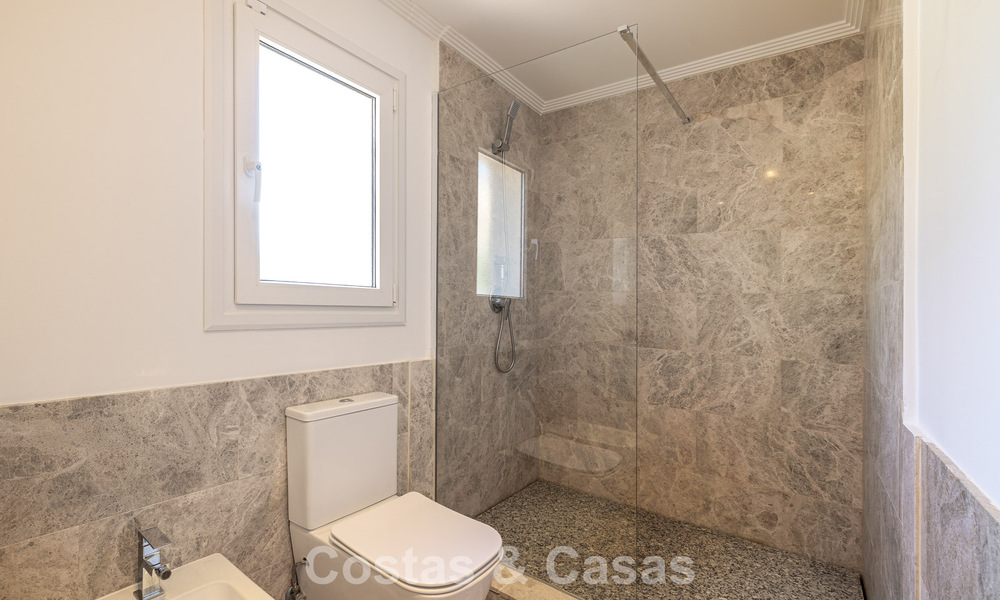 Renovated semi-detached villa for sale with sea view on the golf course east of Marbella 800251