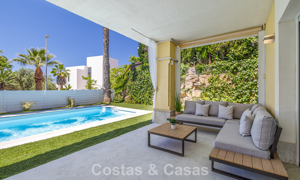 Renovated semi-detached villa for sale with sea view on the golf course east of Marbella 800261