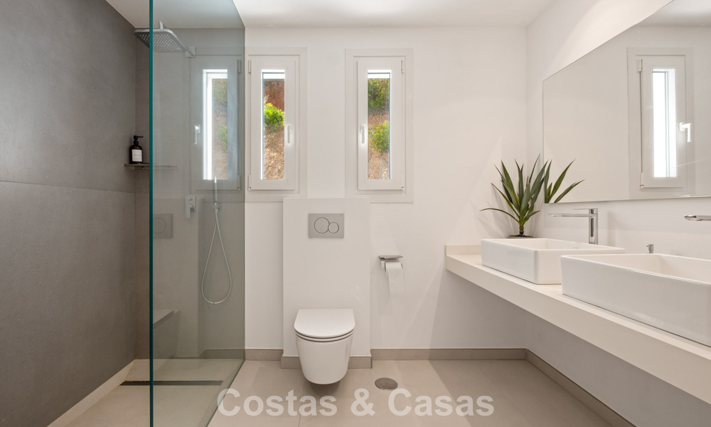 Moderne luxury villa with contemporary architecture and panoramic views for sale in the Hills of Marbella East 800271