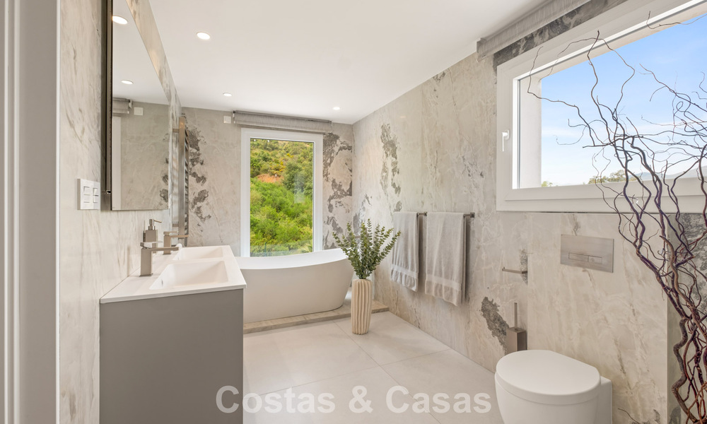 Moderne luxury villa with contemporary architecture and panoramic views for sale in the Hills of Marbella East 800278