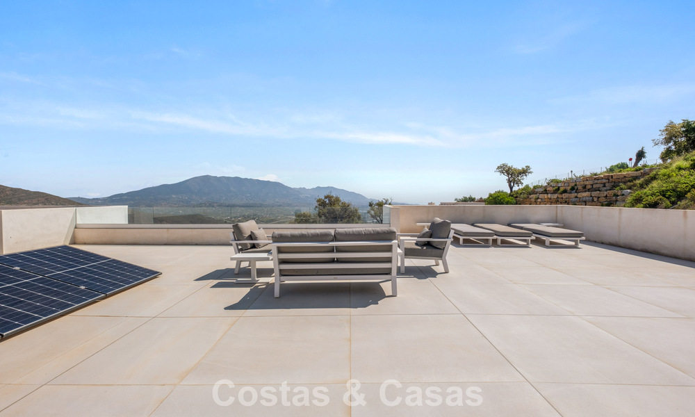 Moderne luxury villa with contemporary architecture and panoramic views for sale in the Hills of Marbella East 800320