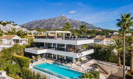 Sophisticated luxury villa for sale with panoramic views in nueva andalucía’s prestigious golf valley, marbella 800333