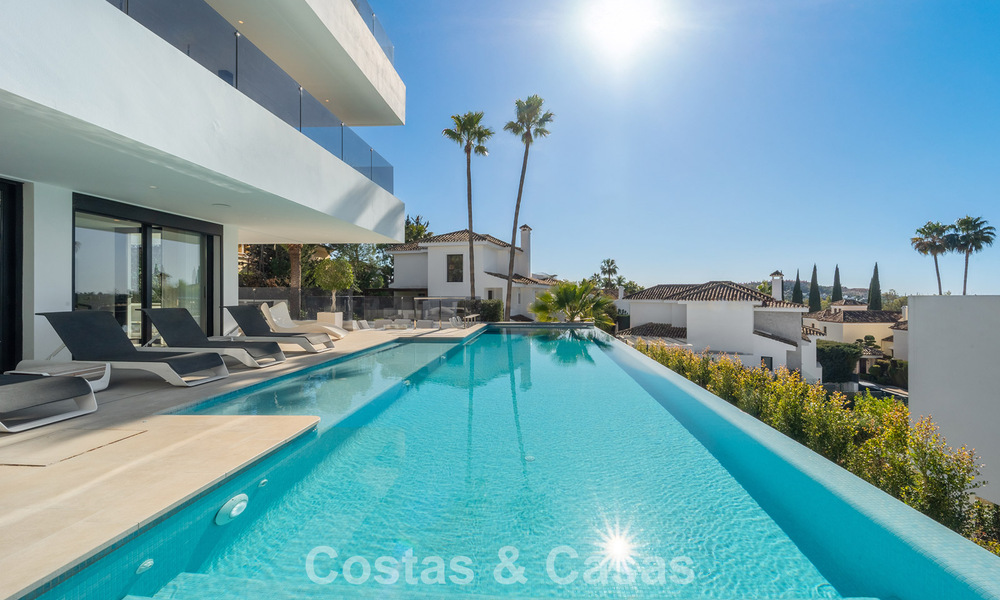 Sophisticated luxury villa for sale with panoramic views in nueva andalucía’s prestigious golf valley, marbella 800339