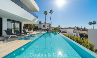 Sophisticated luxury villa for sale with panoramic views in nueva andalucía’s prestigious golf valley, marbella 800339 