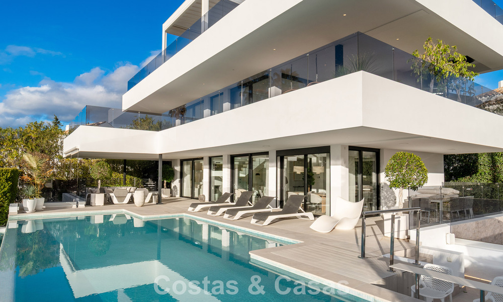 Sophisticated luxury villa for sale with panoramic views in nueva andalucía’s prestigious golf valley, marbella 800340
