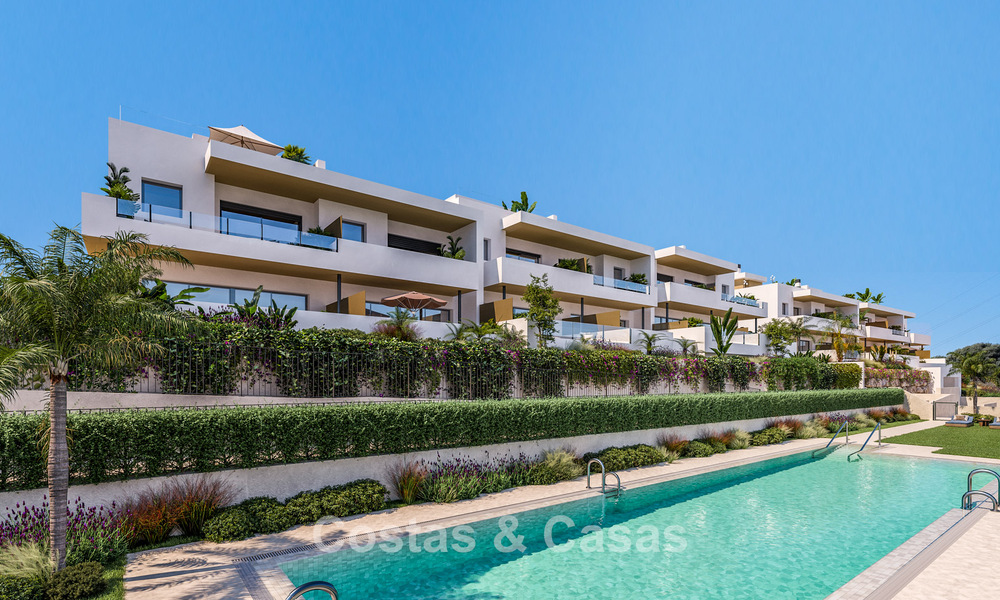 Launch! Contemporary new townhouses for sale in a sought-after golf setting in Estepona 800557