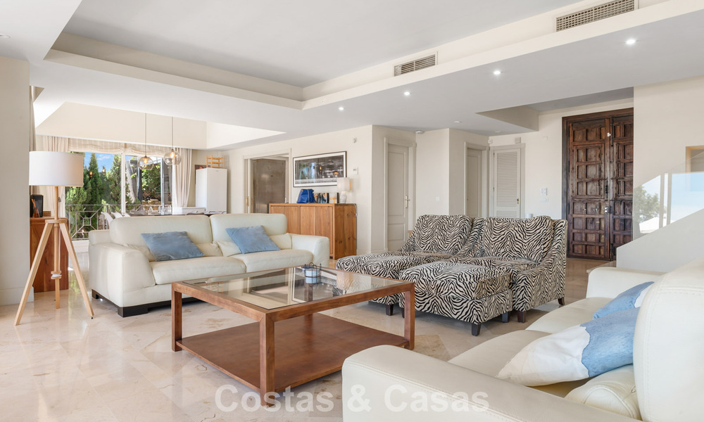 Spacious family villa in a modern Spanish architectural style with breathtaking sea views for sale in Manilva, Costa del Sol 800645