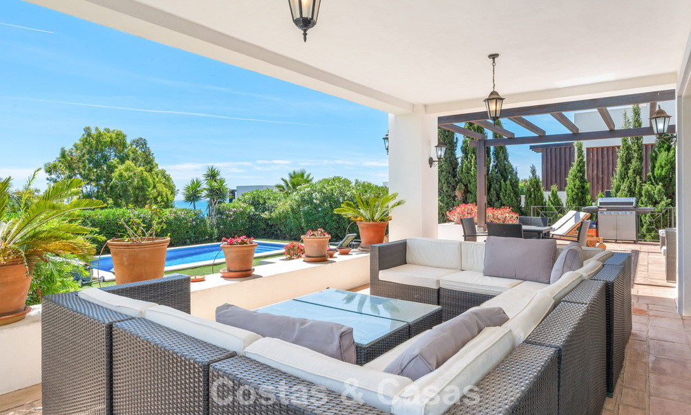 Spacious family villa in a modern Spanish architectural style with breathtaking sea views for sale in Manilva, Costa del Sol 800649
