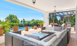 Spacious family villa in a modern Spanish architectural style with breathtaking sea views for sale in Manilva, Costa del Sol 800649 