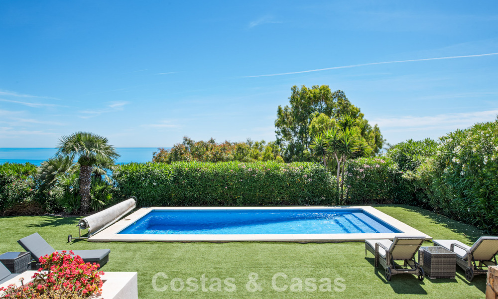 Spacious family villa in a modern Spanish architectural style with breathtaking sea views for sale in Manilva, Costa del Sol 800661