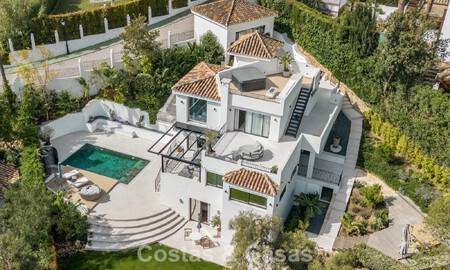Luxuriously, contemporarily, renovated villa for sale in a gated community in Nueva Andalucía’s Golf Valley, Marbella 800734