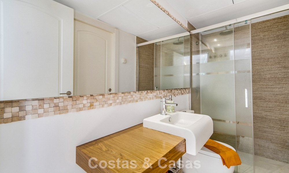 Stunning renovated 4-bedroom townhouse for sale with sea views, frontline beach location on Marbella’s Golden Mile 800840