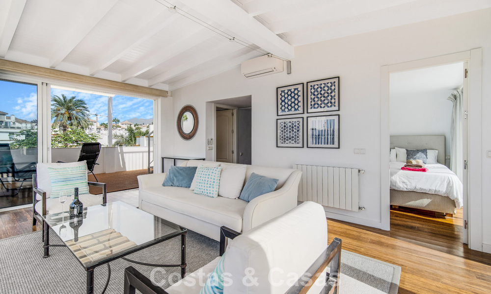 Stunning renovated 4-bedroom townhouse for sale with sea views, frontline beach location on Marbella’s Golden Mile 800853