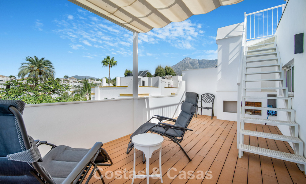 Stunning renovated 4-bedroom townhouse for sale with sea views, frontline beach location on Marbella’s Golden Mile 800856