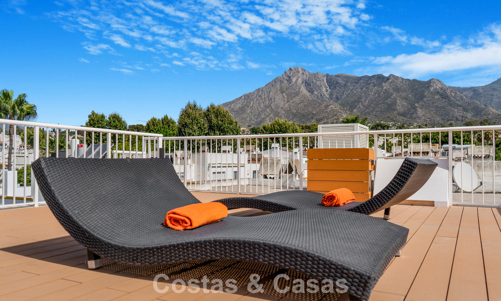 Stunning renovated 4-bedroom townhouse for sale with sea views, frontline beach location on Marbella’s Golden Mile 800860