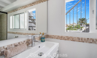 Stunning renovated 4-bedroom townhouse for sale with sea views, frontline beach location on Marbella’s Golden Mile 800862 
