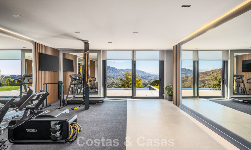 Impressive luxury villa with modern minimalist architecture for sale in the hills of East Marbella 801130