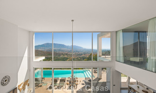 Contemporary luxury villa with sleek modern architecture and breathtaking views for sale in East Marbella 801180 